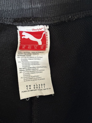 Puma kids' bottoms used, size 164 cm, black
