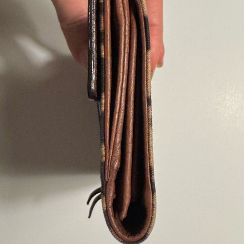 Dolce & Gabbana wallet used with leopard pattern and brown leather