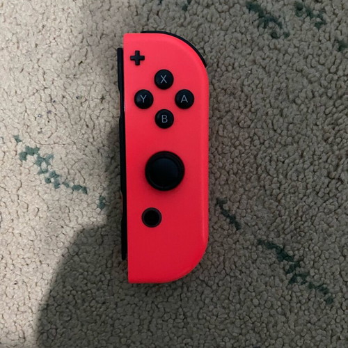 Nintendo Switch dock and controller for Joy Con, red Joy Con like new