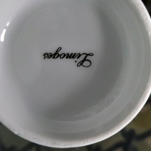 Limoge coffee cup set used, 2 cups with Hermes feather design