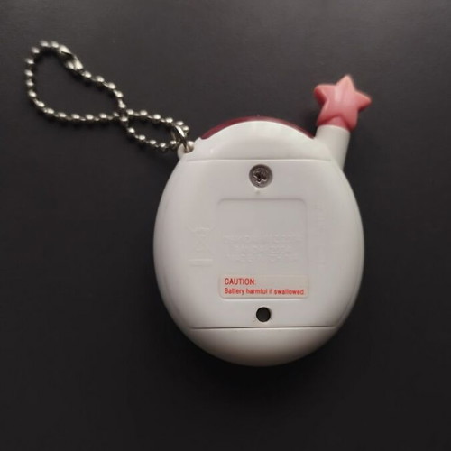 Tamagotchi Connection Pink Star 2004 used, white with flowers