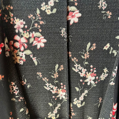 Set of two playsuits rompers like new, black floral and striped Bershka