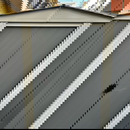 Metal storage shed ideal for outdoor space, spacious