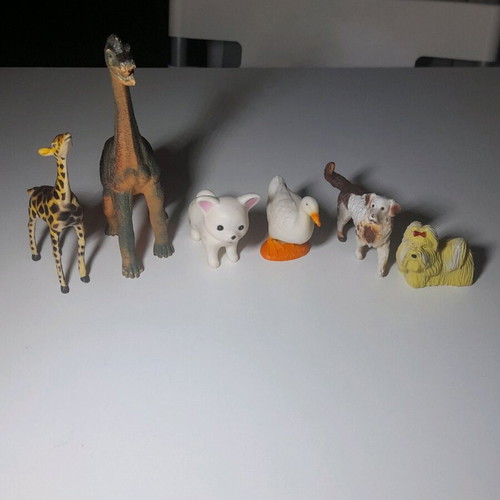 Rubber dinosaurs and animals used, set of 31 pieces