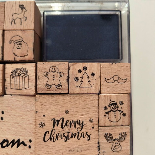 Craft set with wooden Christmas stamps used