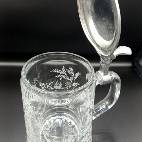 Glass beer mug with embossed hunting design like new from West Germany
