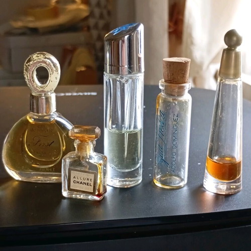 Perfume miniatures used, pack with wear