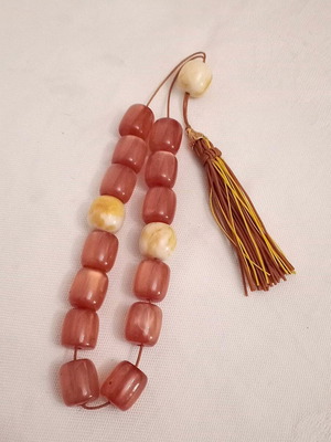 Worry beads with synthetic resin beads in orange color like new