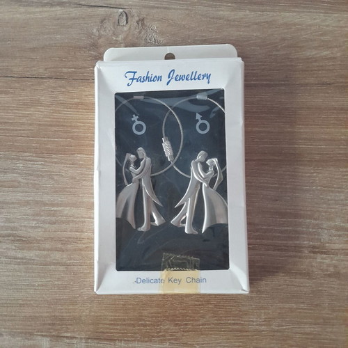 Keychain couple new, in box with wear