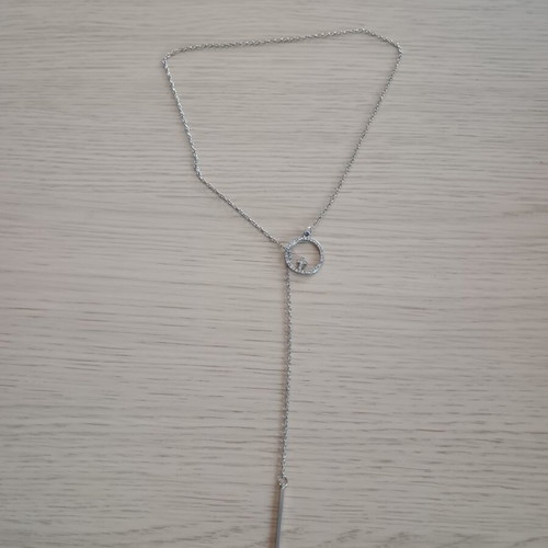 Lariat necklace with thin chain and circular motif used