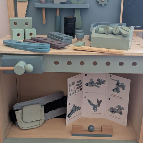 Little Dutch wooden tool bench used with tools and accessories