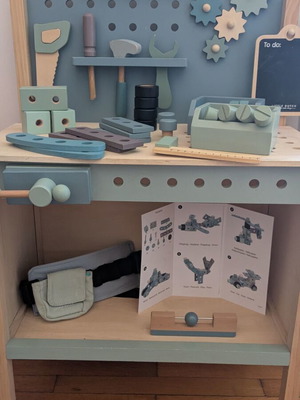 Little Dutch wooden tool bench used with tools and accessories