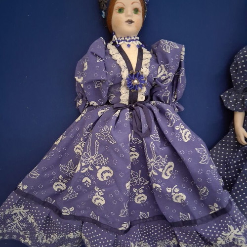 Vintage Slavic doll with porcelain head and fabric body