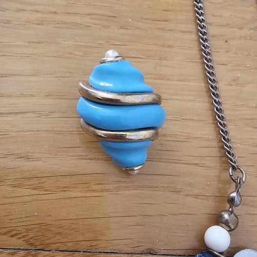 Vintage necklace and earrings set used in turquoise colors