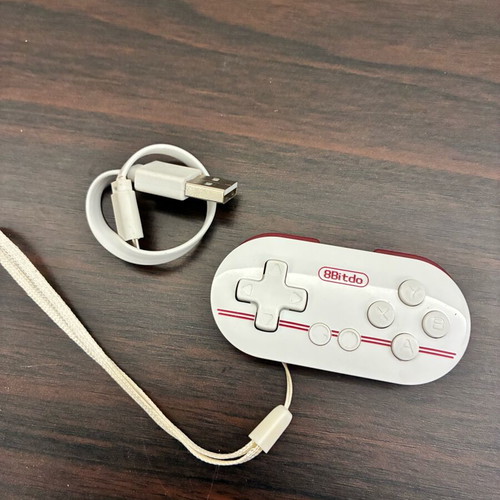 8BitDo Zero gamepad used with USB cable