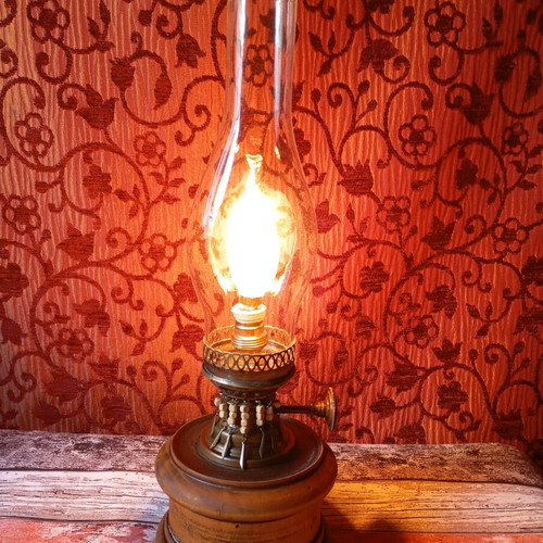 Rustic old lamp with Edison filament bulb used