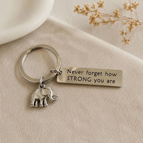 Keychain with metal elephant charm and engraved message, new, silver