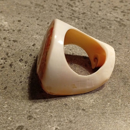 Bone ring with spiral design like new, orange