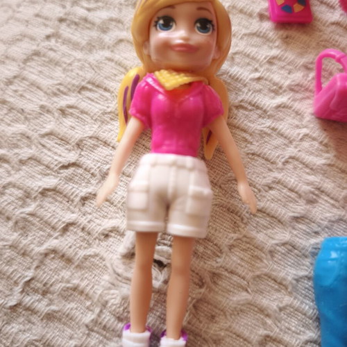 Polly Pocket doll with original clothes and shoes, used