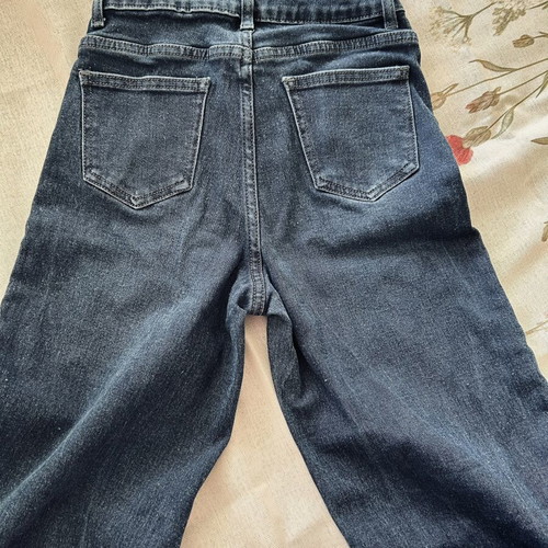 Jeans with butterfly and rhinestone details, size XS, like new