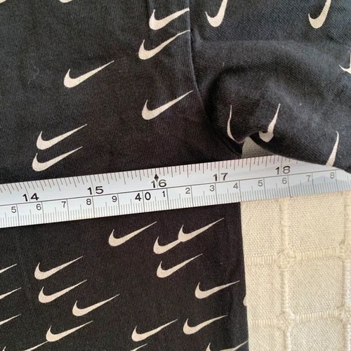 Nike T-shirt XS used with red marks on neck and label, black and white