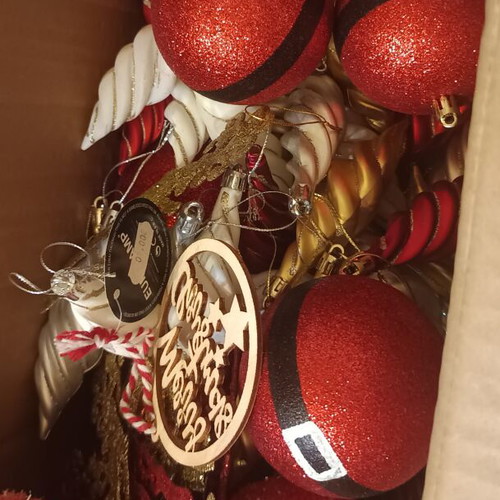 Christmas ornaments like new, box with balls and branches in gold red silver white tones
