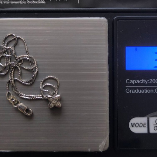 White gold 18K cross with 5 brilliant cut diamonds like new