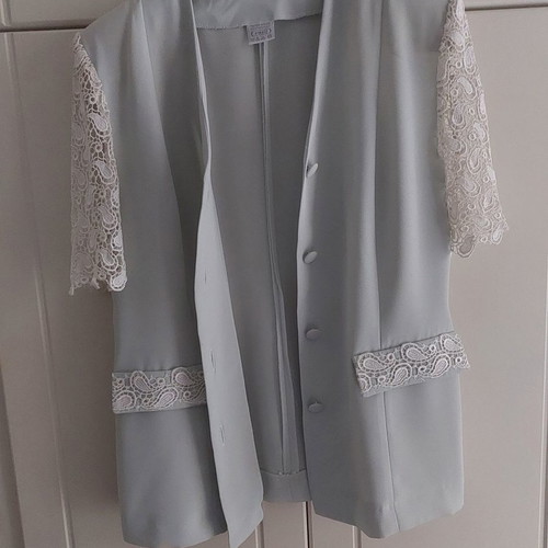 Women's jacket with lace sleeves used, size 50