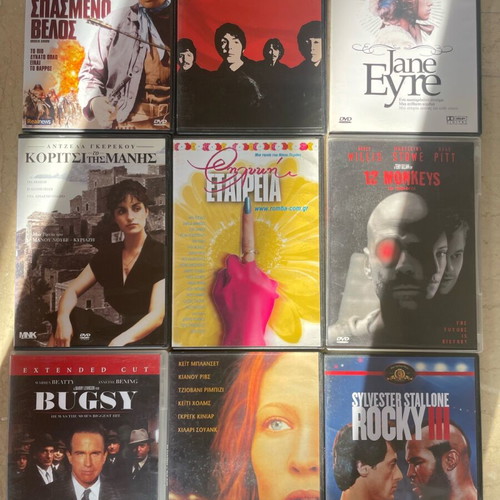 40 DVD movies in slim cases