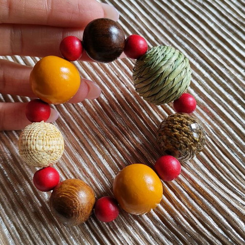 Colorful bracelet with wooden beads like new