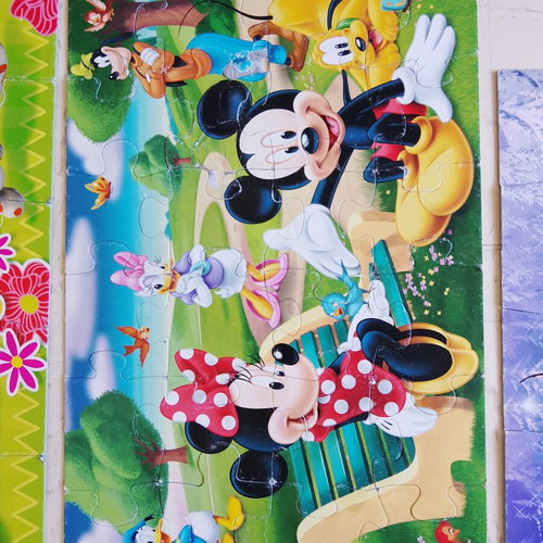 Disney puzzles pack of 4 used with Minnie, Mickey Mouse, Frozen