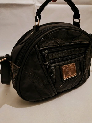 Leather backpack used, black, with zipper, 15x25cm