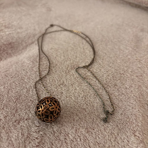 Vintage long necklace with bronze filigree floral ball pendant