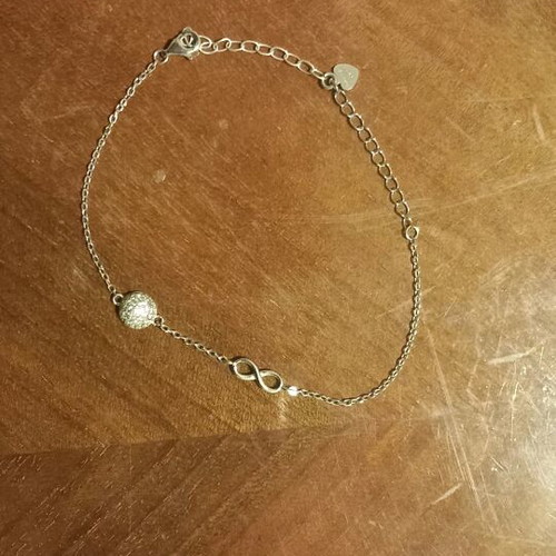 Silver bracelet with stones and infinity symbol like new