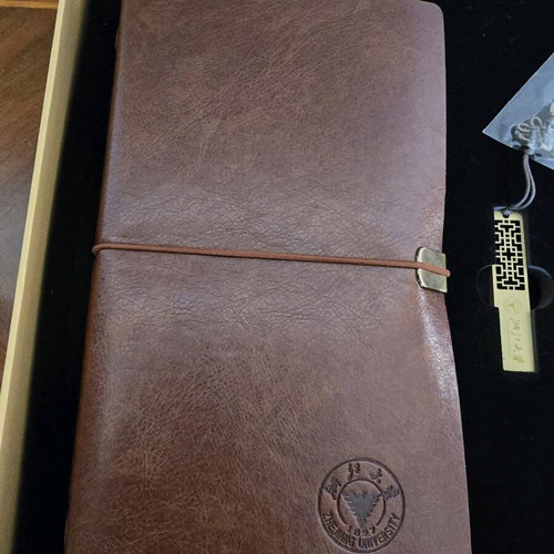 Zhejiang University collectible memorabilia set new with pen, flash drive, and notebook