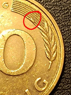 10 Pfennig 1995 coin used with error extra metal