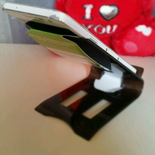 Phone stand new, black color with impressive design