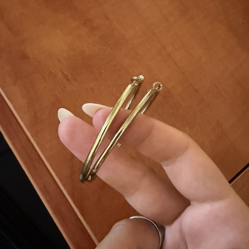 Gold color faux earrings used, slightly faded