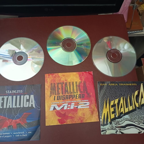 Metallica CD set like new, 3 pieces, non-album tracks