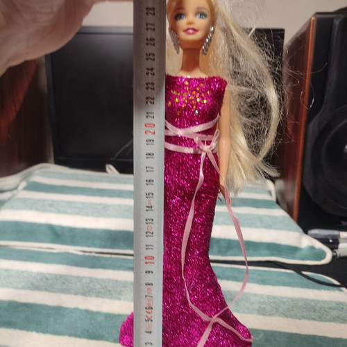 Doll with formal dress used, good condition