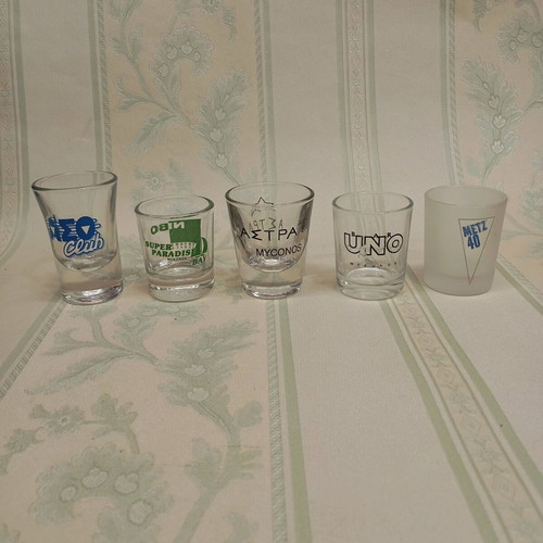 Collection of 87 shot glasses new, promotional and collectible