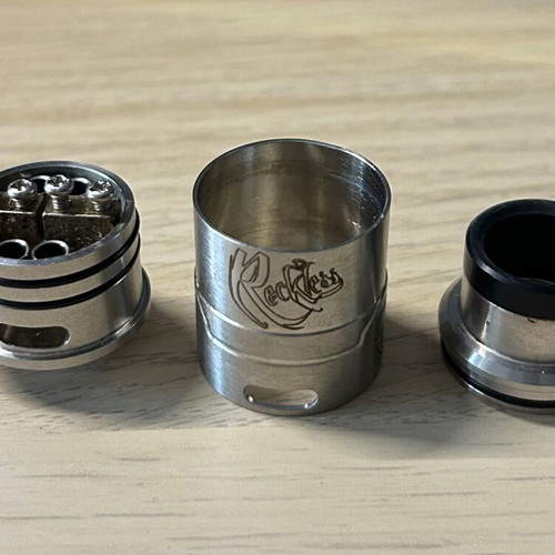Phenom Vaporizers The Reckless RDA used, stainless steel