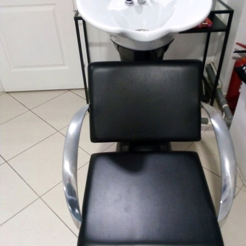 Hair salon chair used with leather seat and stainless steel arms