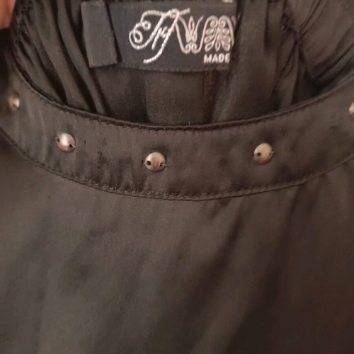 Black mini dress used with small gold studs