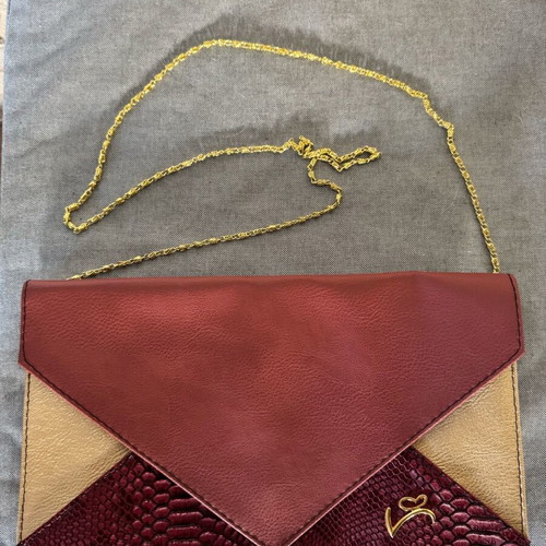 Veta women's envelope bag like new, red with gold chain