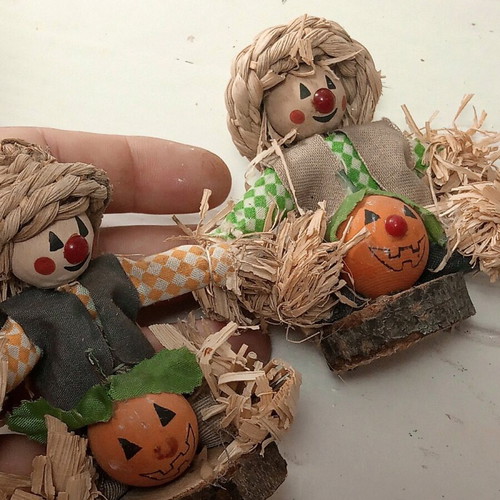 Set of two scarecrow figurines with pumpkin made of natural materials like new