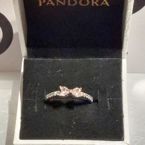 Pandora ring size 8 with pink zircon bow design