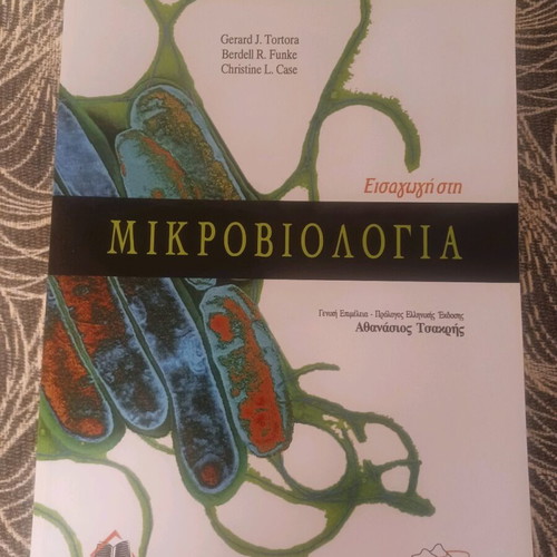 Introduction to Microbiology book like new