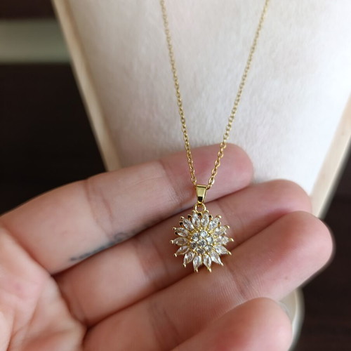 Necklace from stainless steel with zircon like new, gold tone, rotating