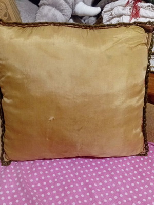 Handmade vintage folk figure pillow used